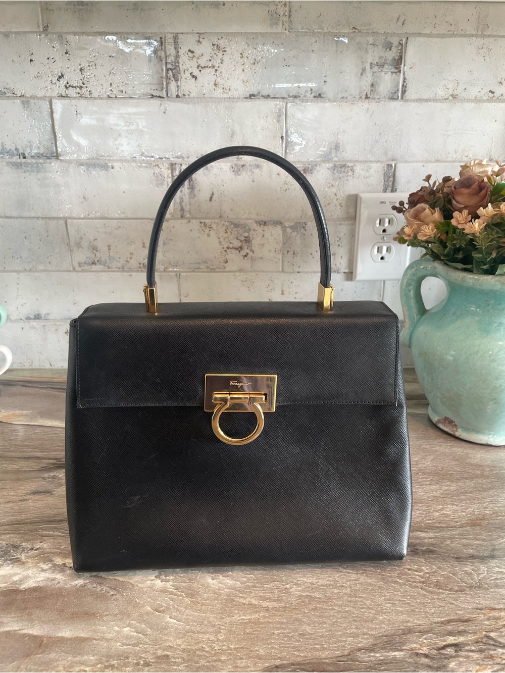 Salvatore Ferragamo Black Leather Top-Handle Satchel with Gold Hardware